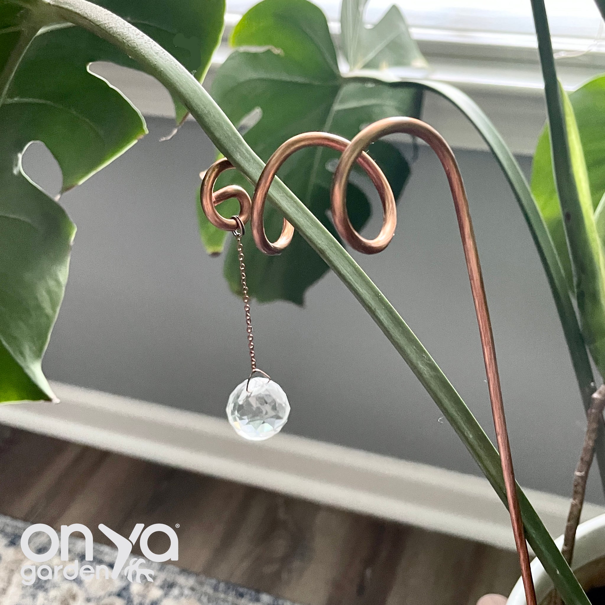 Crystal plant stakes now available! Wrapped with copper wire to